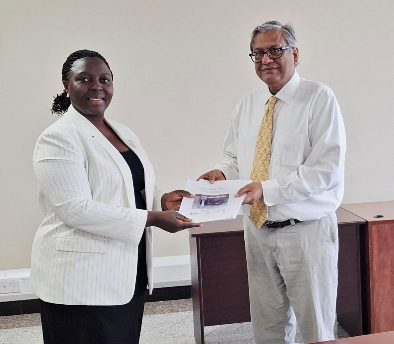 Professor Vijay Modi meeting with Permanent Secretary Engr. Irene Bateebe